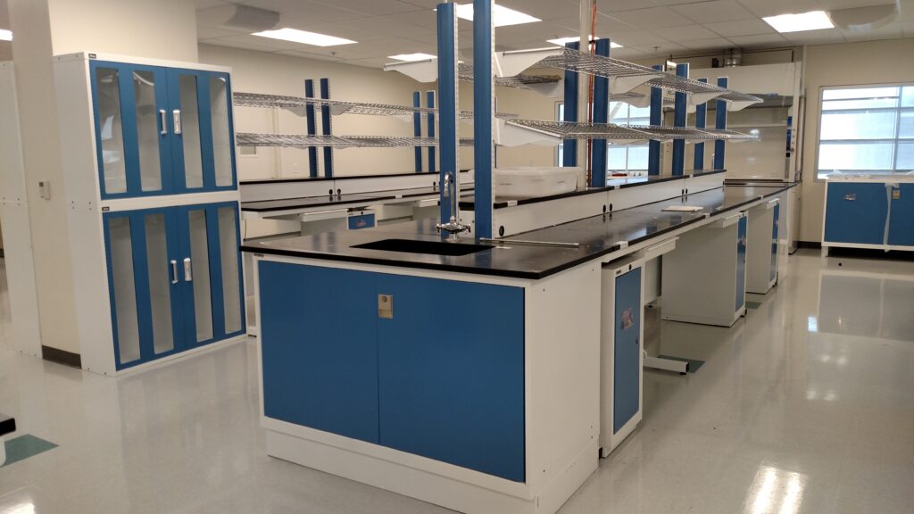 Modern modular laboratory island table and storage cabinets